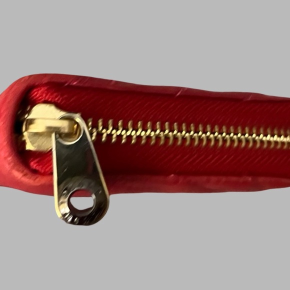 Henri Bendel red quilted wallet with a gold-tone logo. - Picture 4 of 16